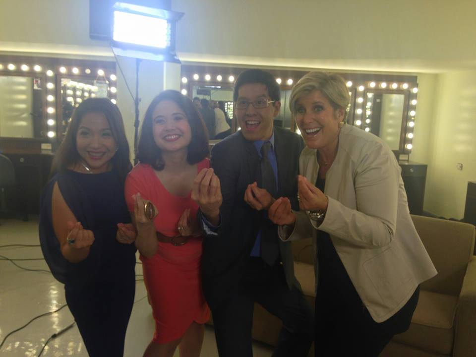 Edric and his co-hosts with Suze Orman 